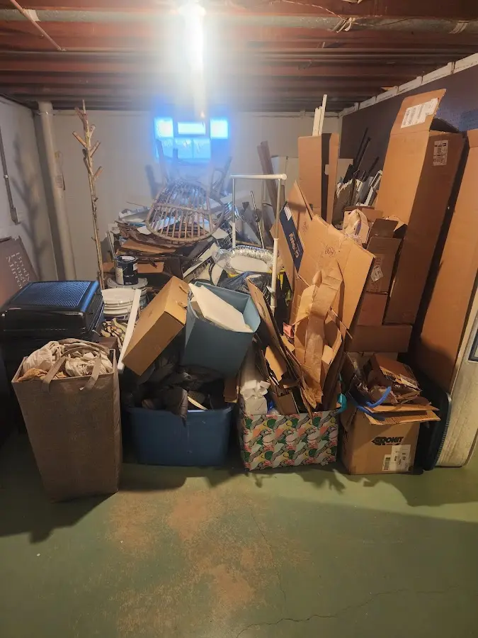 Roll-off dumpster container at job site for Yard Waste Dumpster Rental in Albertville